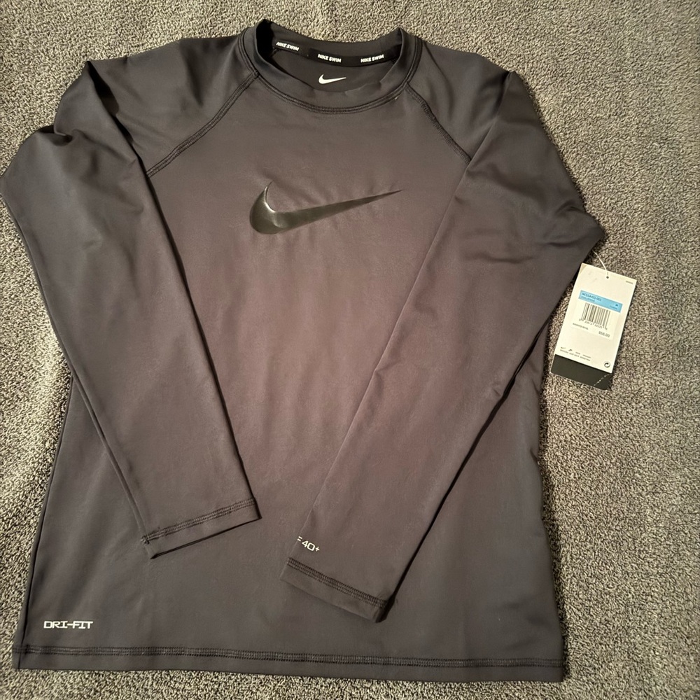 Men’s Nike swim top. Medium black.
